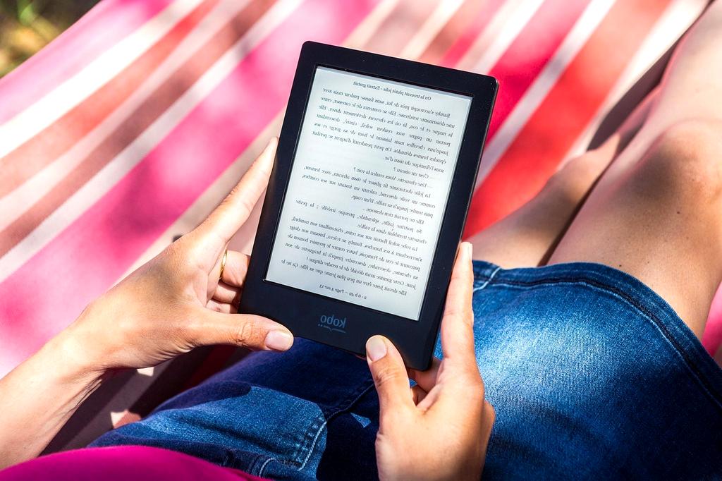 Open book with digital interface overlay